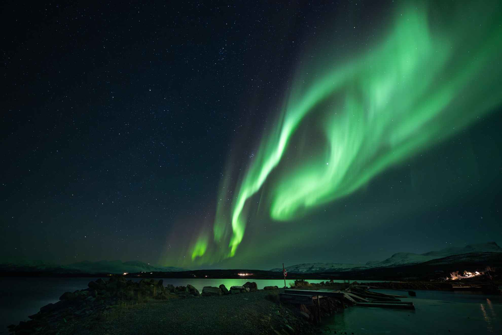 Northern Lights in a bright green on a dark night sky