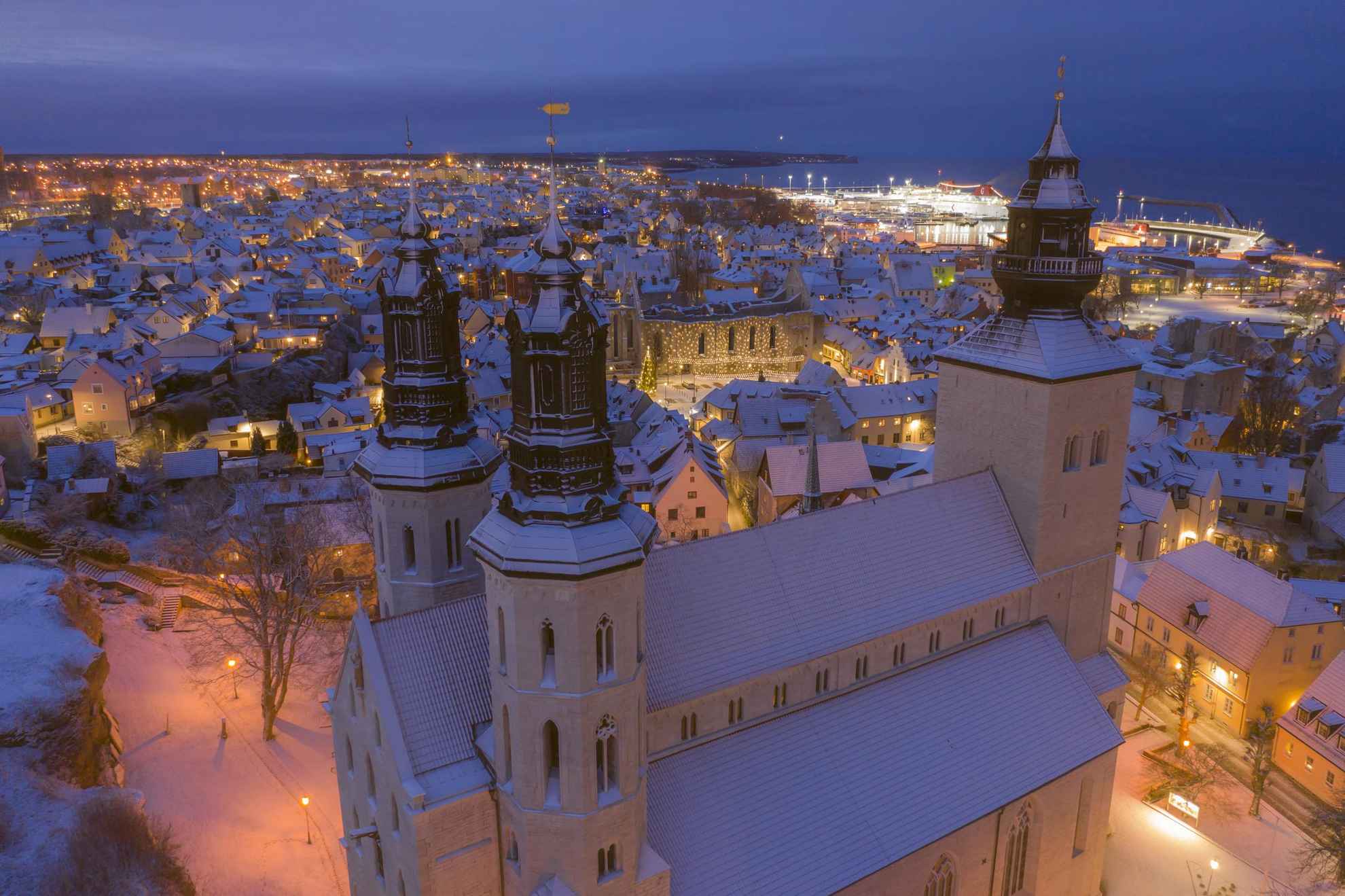 An aerial view of a church in Visby during winter.
