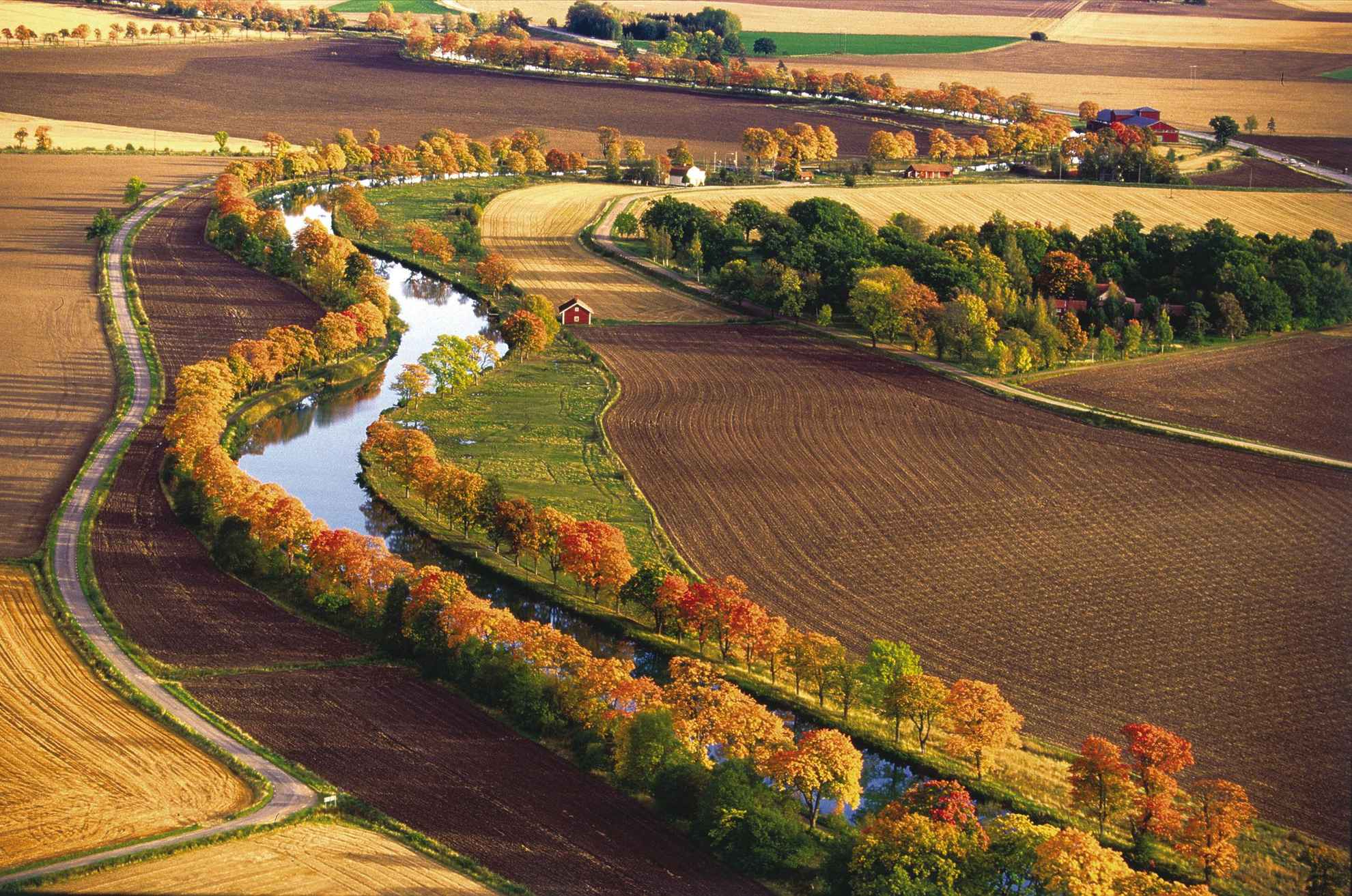 Aeriall view of Gota Kanal and surrounding farming landscape with autumn colours.