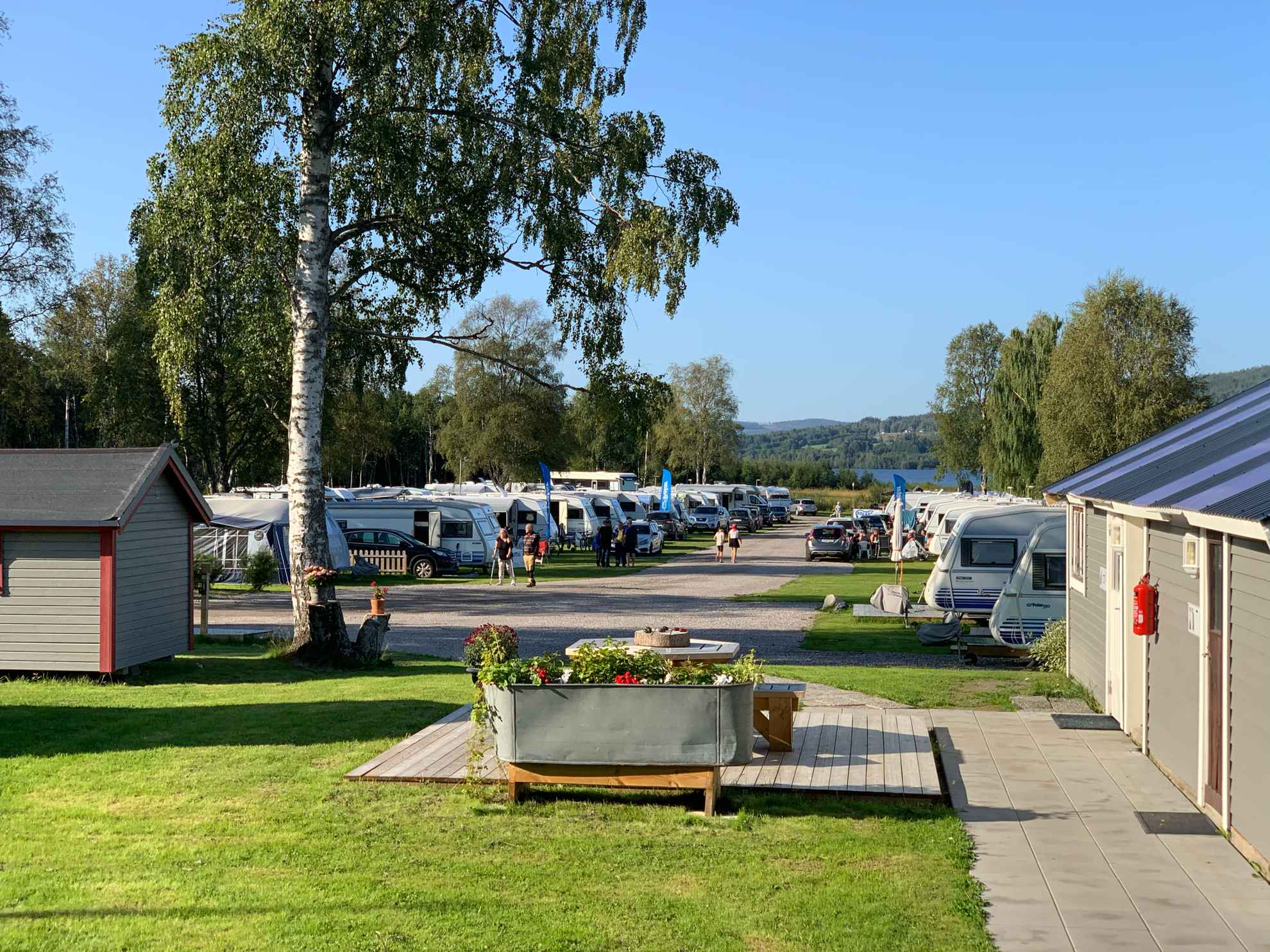 Caravans parked in a row at Överhörnäs Camping