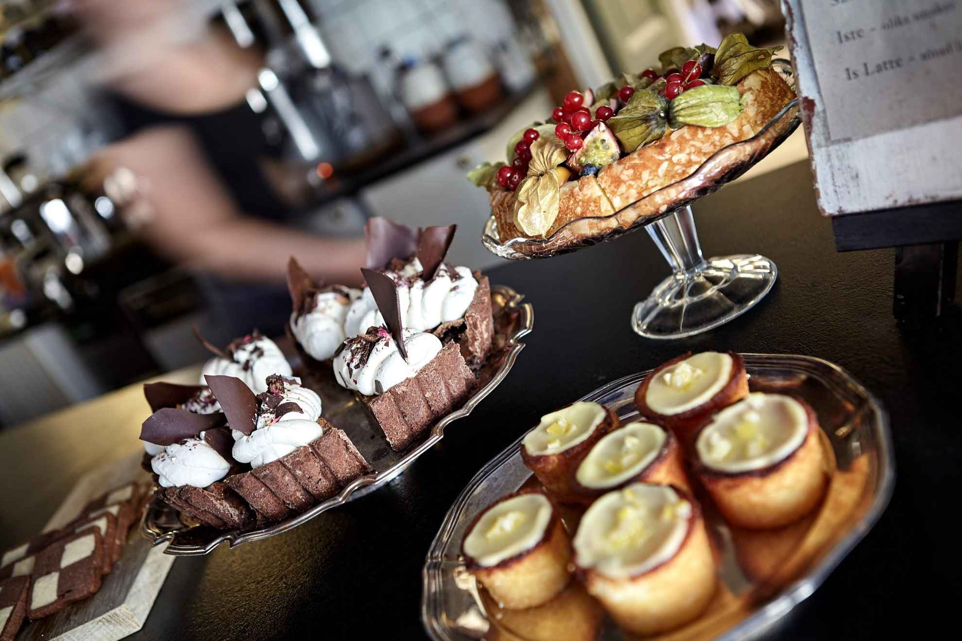 Pies and cakes on a buffet.