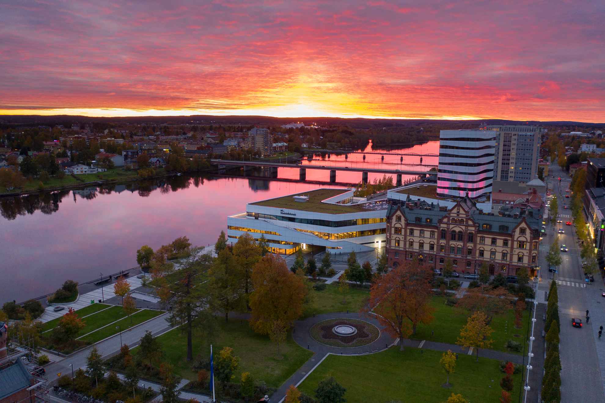 Sunset over the river and the city in Umeå.