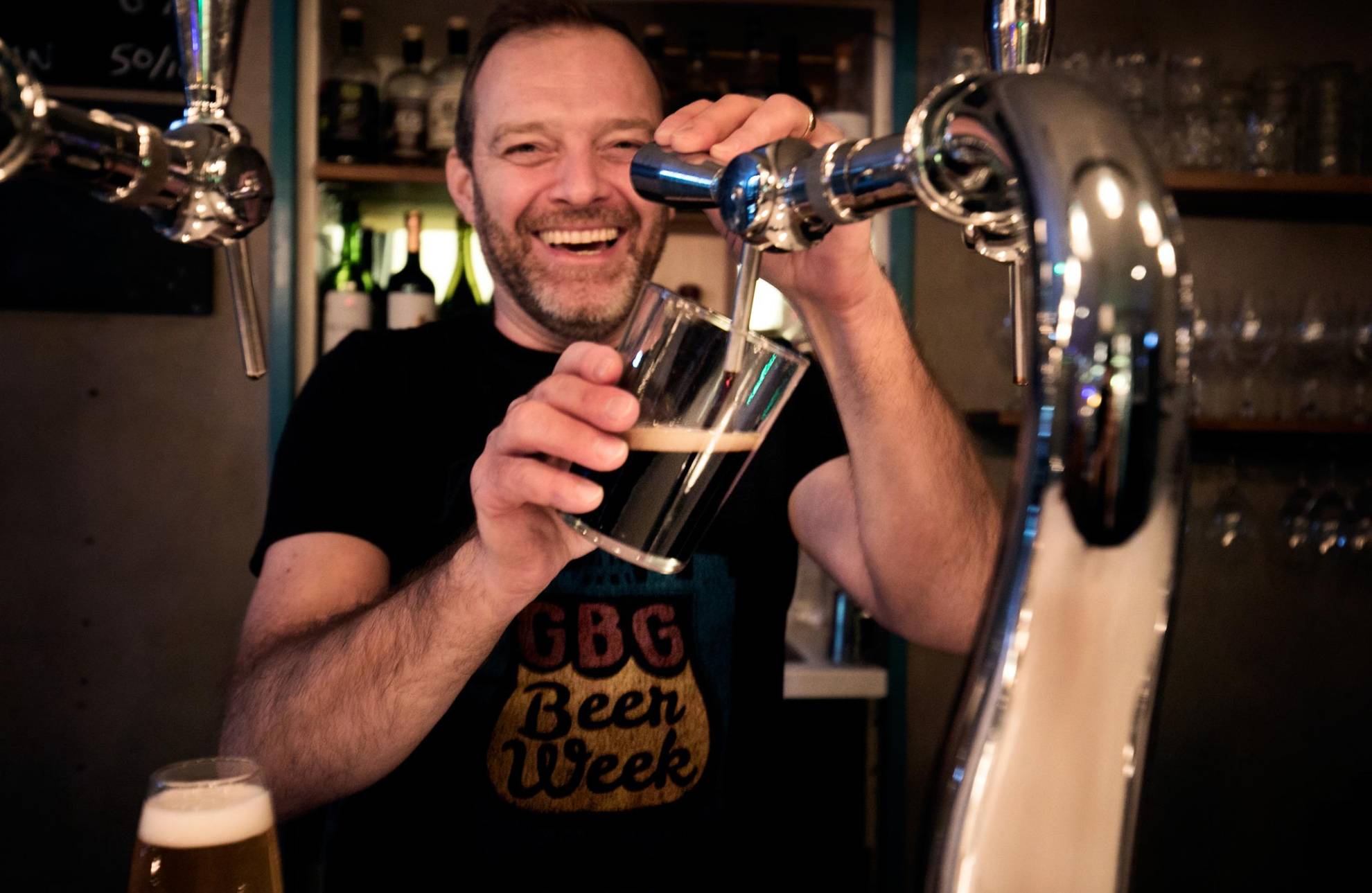 Happy bartender at Brewers Beer Bar, Gothenburg.