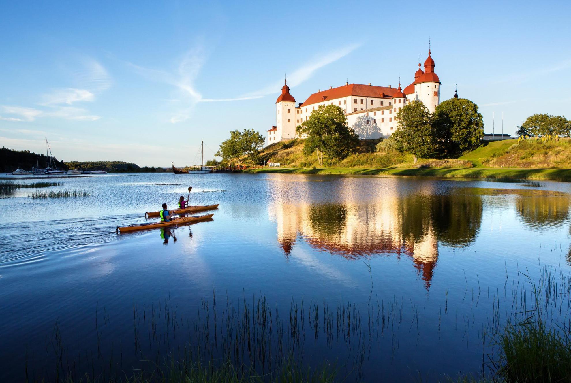 Canoeing by Läckö castle, West Sweden