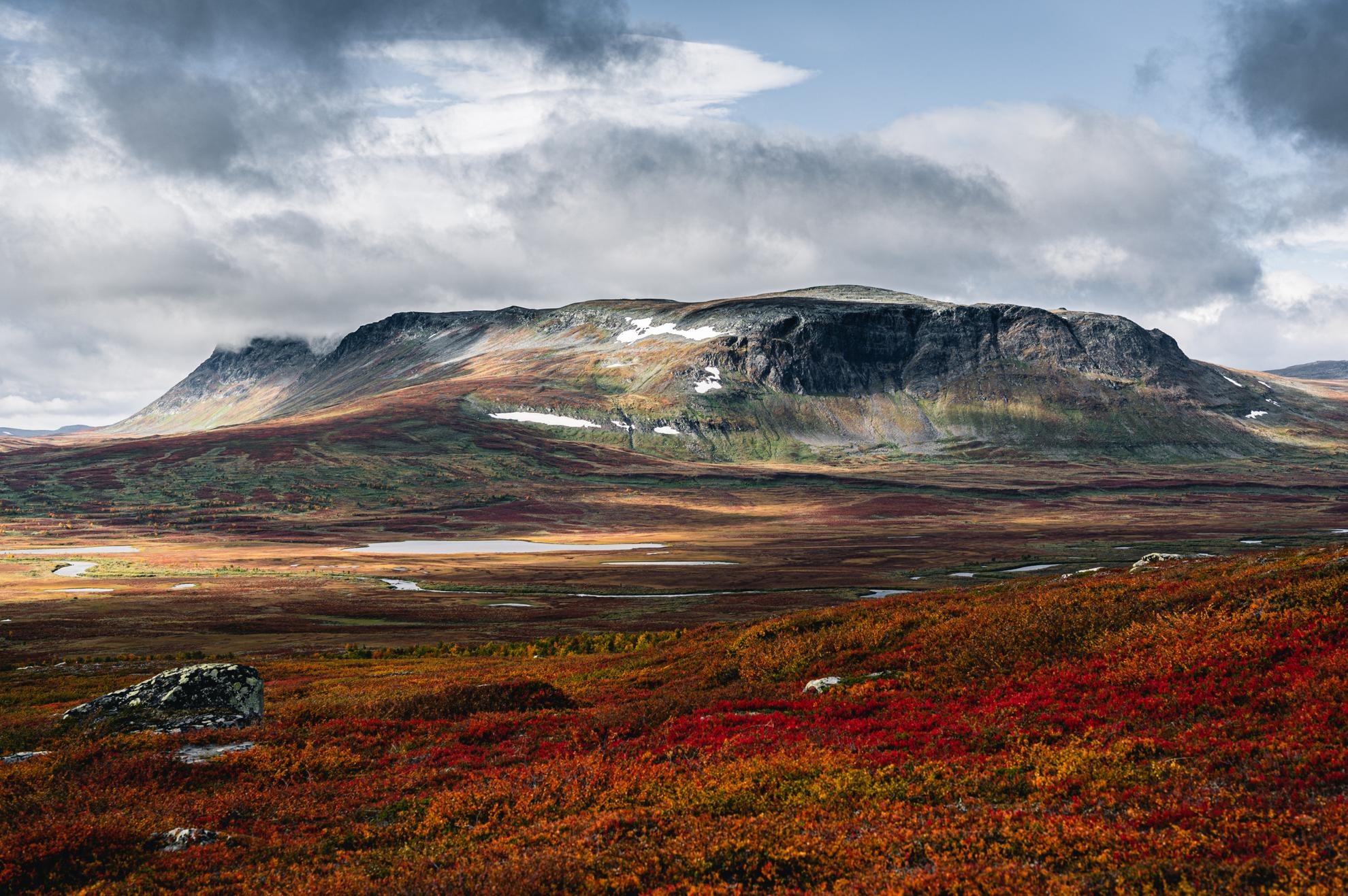 Landscape view of mountainous terrain with autumn colours.