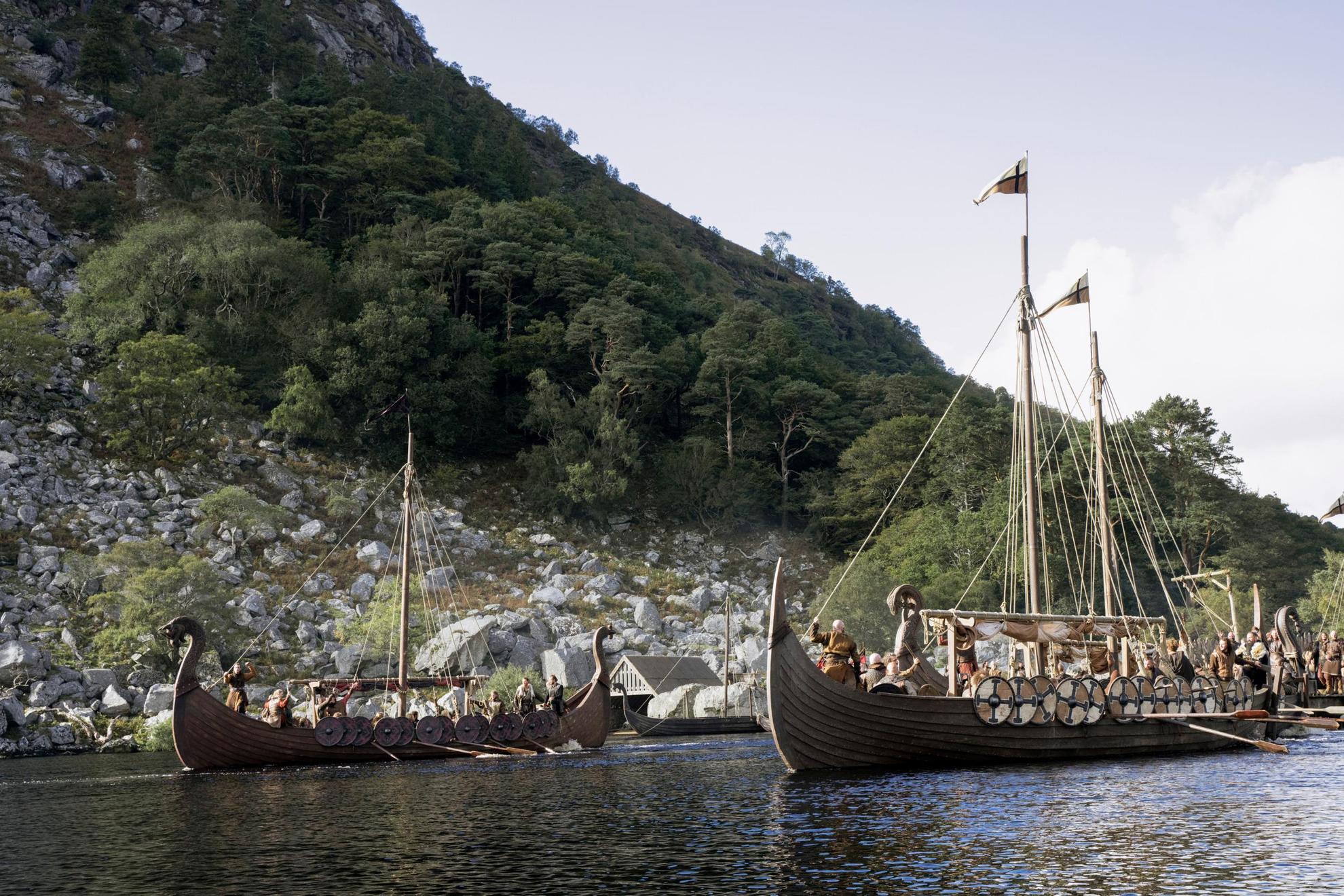 Vikings in viking boats. An image from the tv series Vikings: Valhalla.